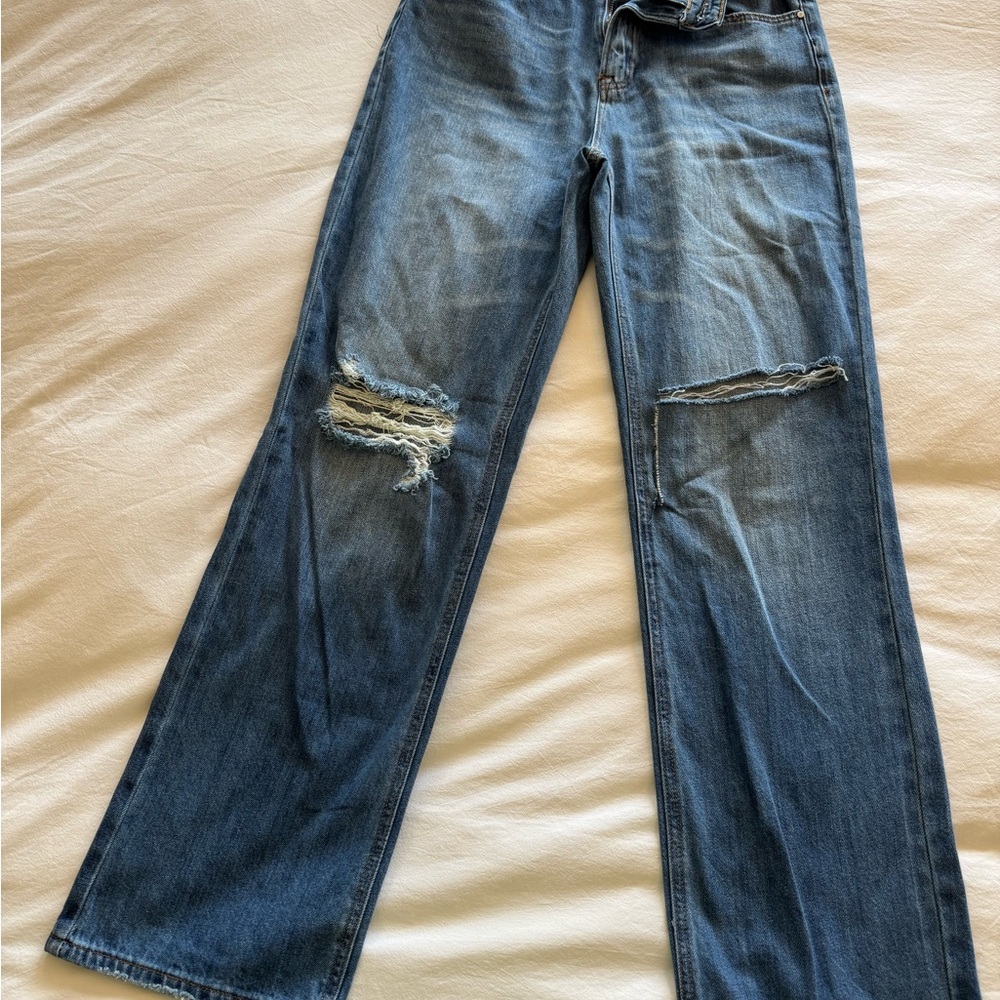 High-Rise Wide-Leg Distressed Jeans in Medium Blue